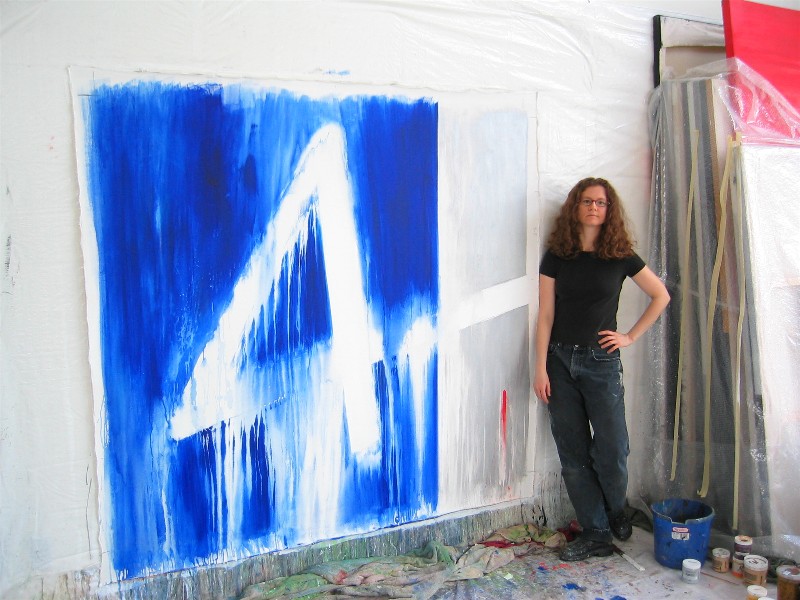 Marta Baricsa with a blue painting
