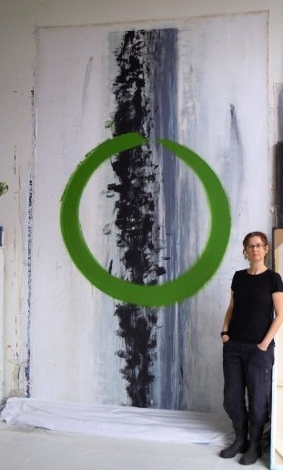 Marta Baricsa with Om painting
